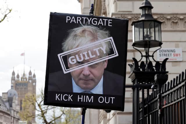 As Prime Minister, Boris Johnson spent considerable time and effort trying to defend himself over the Partygate scandal (Picture: Tolga Akmen/AFP via Getty Images)