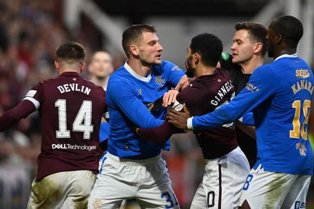EDINBURGH, SCOTLAND - DECEMBER 12: Hearts Josh Ginnelly gets a red card during a Cinch Premiership match between Heart of Midlothian and Rangers at Tynecastle Park, on December 11, 2021, in Edinburgh, Scotland. (Photo by Craig Williamson / SNS Group)