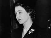 Queen Elizabeth II arriving back in London from Africa on February 7, 1952, the day after the  death of her father, George VI.  (Photo by INTERCONTINENTALE / AFP) (Photo by -/INTERCONTINENTALE/AFP via Getty Images)