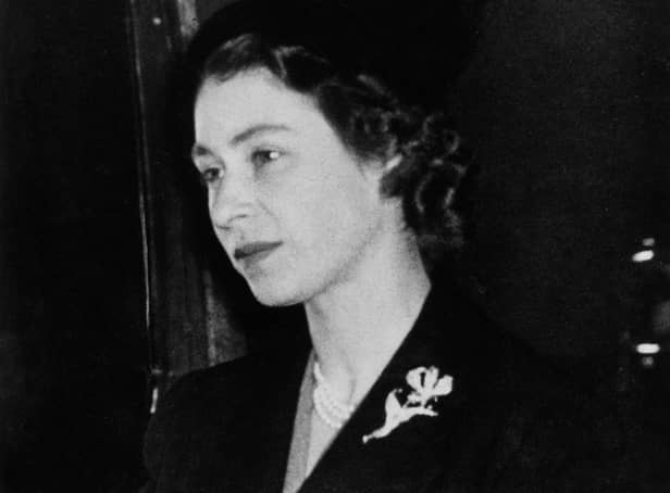 Queen Elizabeth II arriving back in London from Africa on February 7, 1952, the day after the  death of her father, George VI.  (Photo by INTERCONTINENTALE / AFP) (Photo by -/INTERCONTINENTALE/AFP via Getty Images)