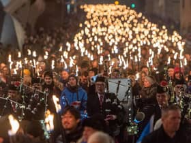 Edinburgh's traditional torchlight procession was dropped from this year's Hogmanay programme due to a lack of funding and the economic climate. Picture: Ian Georgeson