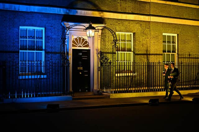 The symbolic support of lighting up Downing Street in Ukrainian colours may be heartfelt but it has little practical effect (Picture: Jeff J Mitchell/Getty Images)