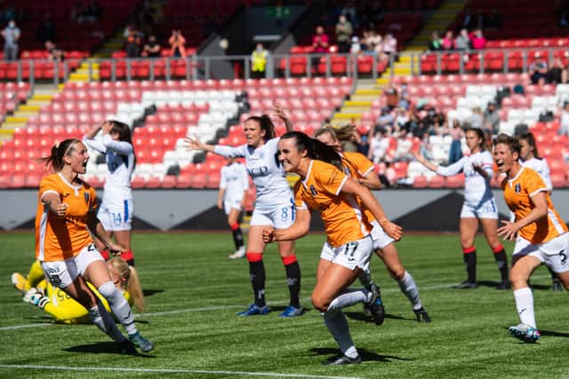 CUMBERNAULD, SCOTLAND - JUNE 06: Niamh Farrell (centre) celebrates her goal to make it 2-0 Glasgow City. (Photo by Mark Scates / SNS Group)