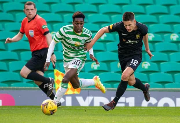 Celtic's Jeremie Frimpong and Jullien Serrano in acion during a Scottish Premiership match between Celtic and Livingston at Celtic Park on September 19, 2020, in Glasgow, Scotland. (Photo by Rob Casey / SNS Group)