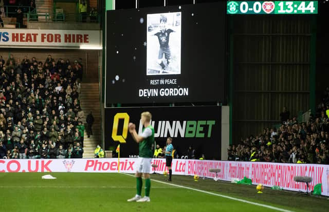 Play stopped to pay tribute to Devin Gordon. (Photo by Ross Parker / SNS Group)