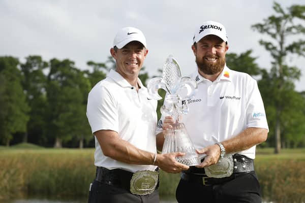 Rory McIlroy and Shane Lowrypose with the trophy after winning the Zurich Classic of New Orleans at TPC Louisiana. Picture: Chris Graythen/Getty Images.