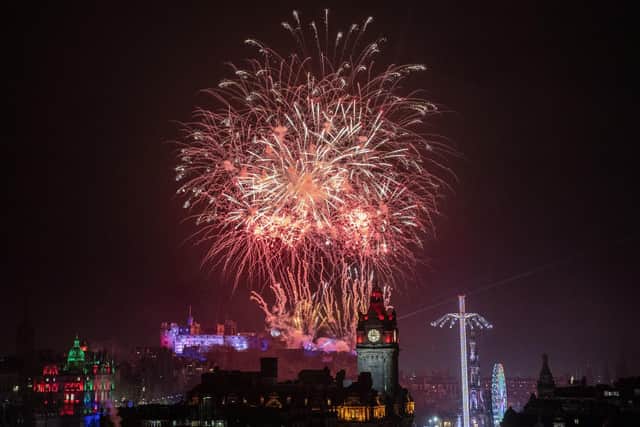 Fireworks explode over Edinburgh Castle during a previous Hogmanay celebration. Picture: Jane Barlow/PA Wire