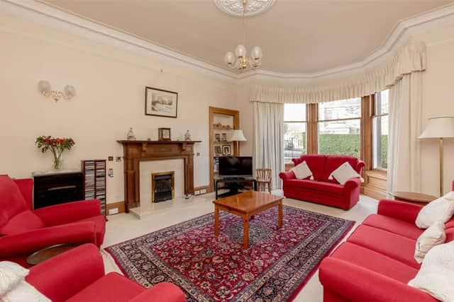 Bay windows bring plenty of day light into the front sitting room