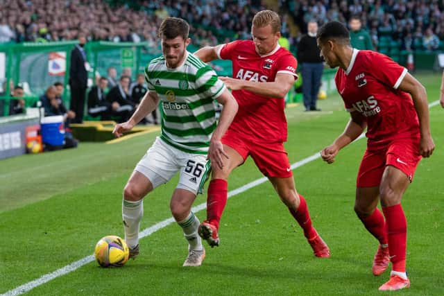 Celtic's Anthony Ralston makes his way down the touchline watched by Alkmaar's Dani de Wit. (Photo by Ross Parker / SNS Group)