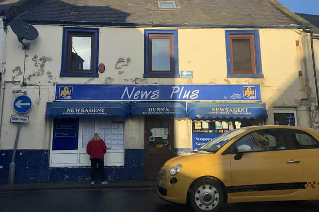 The picture of a newsagent window taken by Jennifer Jones @jennifermjones illustrates the stark reality of Covid-19, the exhausting pain that the virus continues to inflict as the death toll rises in Stranraer.
