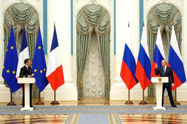 More diplomatic talks with Vladimir Putin, seen during a visit by French President Emmanuel Macron, are vital (Picture: Thibault Camus/pool/AFP via Getty Images)