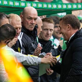 Celtic manager Brendan Rodgers celebrates with coach Gavin Strachan after the opening goal in the 3-0 win over Hearts. (Photo by Craig Foy / SNS Group)
