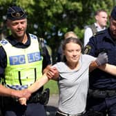 Greta Thunberg, seen being arrested in Malmo during a protest, may not be everyone's cup of tea, but that doesn't disprove climate science (Picture: Andreas Hillergren/TT News Agency/AFP via Getty Images)