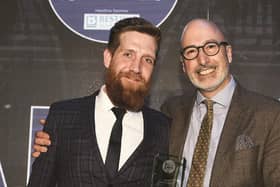 Callum Hain of Akva in Fountainbridge, left, is handed the Best Family Friendly title by Victor Contini at the last Edinburgh Evening News Restaurant Awards ceremony held in 2019. Picture: Neil Hanna