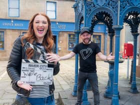 Gayle Telfer-Stevens, who plays Caitlin McLean, and Stephen Purdon, who plays Bob O'Hara, celebrate the re-start of filming today.