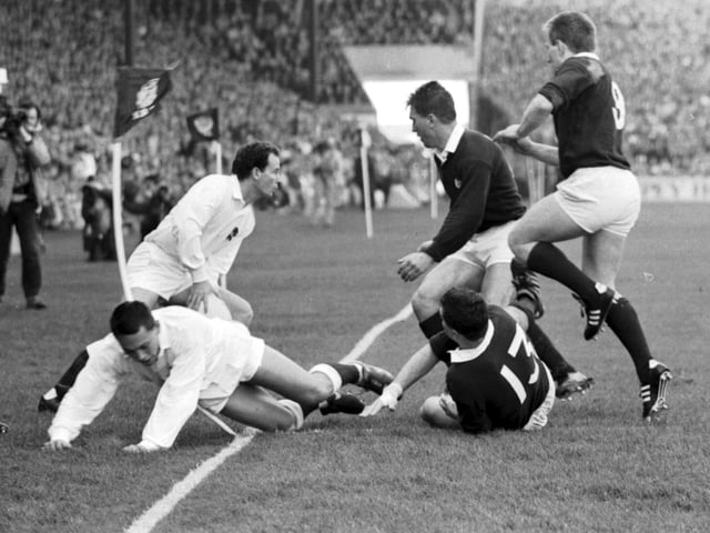 Iwan Tukalo, and Gary Armstrong wait for England's next move in the Scotland v England match at Murrayfield.