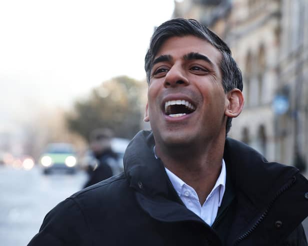 Prime Minister Rishi Sunak walks through the local streets during a visit to Winchester, England. Picture: Dan Kitwood/Getty Images