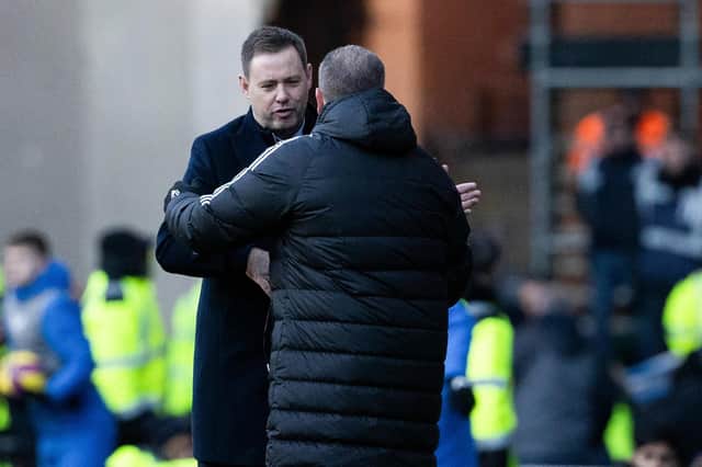 Rangers manager Michael Beale and Celtic manager Ange Postecoglou shake hands during Monday's Rangers v Celtic derby.