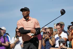 Tiger Woods tees off on the ninth hole during a practice round at the British Open golf championship on the Old Course at St. Andrews.