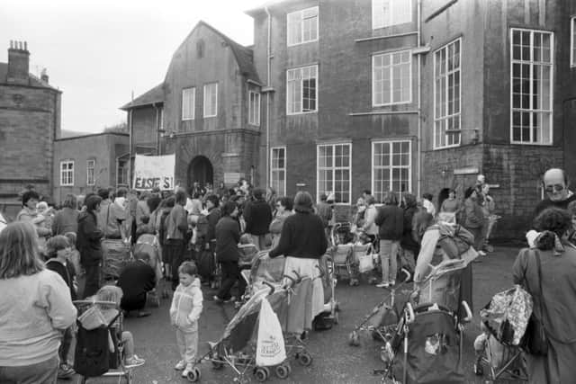 Mothers and children demonstrate outside the Elsie Inglis Memorial Hospital in the Abbeyhill area of Edinburgh on the last day before it closed in October 1988. Picture: Denis Straughan