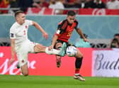 Eden Hazard of Belgium battles for possession with Alistair Johnston of Canada.