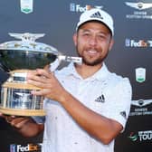 Xander Schauffele poses with the Genesis Scottish Open Trophy after his victory at The Renaissance Club in East Lothian. Picture: Andrew Redington/Getty Images.