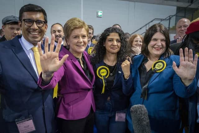 First Minister Nicola Sturgeon with SNP's Zen Ghani, Roza Salih (second right) and Susan Aitken (right) at the Glasgow City Council count at the Emirates Arena in Glasgow, in the local government elections. Picture: PA