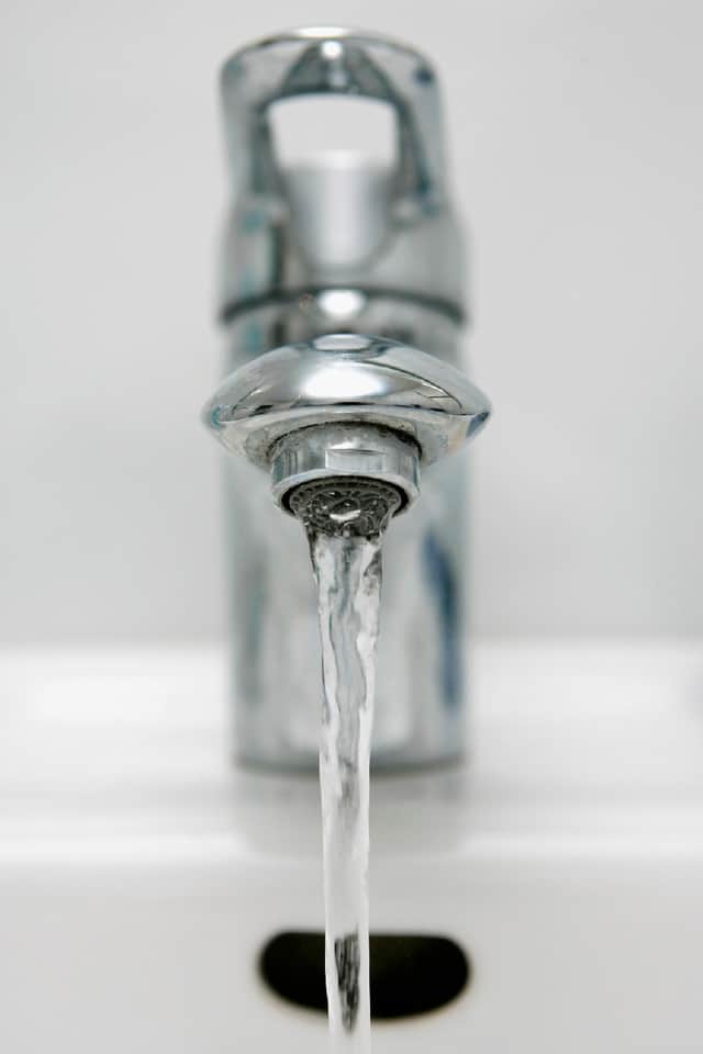 SCHWELM, GERMANY - JANUARY 10: Water pours down from the water tap on January 10, 2007 in Schwelm, Germany. (Photo Illustration by Christof Koepsel/Getty Images)