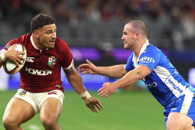 Sione Tuipulotu of the British & Irish Lions is tackled by Dylan Pietsch tackles during the tour match against Western Force at the Optus Stadium in Perth, Australia. (Photo by David Rogers/Getty Images)
