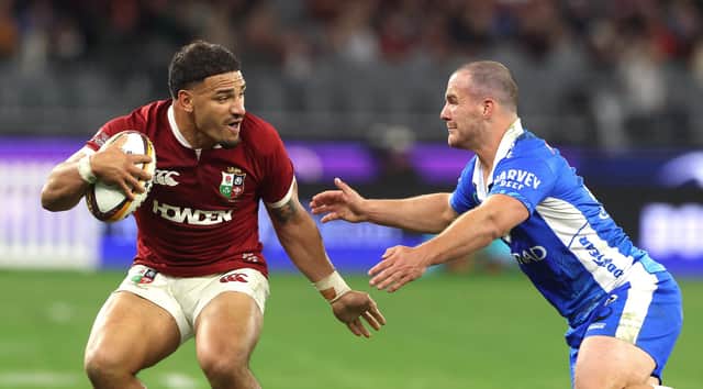 Sione Tuipulotu of the British & Irish Lions is tackled by Dylan Pietsch tackles during the tour match against Western Force at the Optus Stadium in Perth, Australia. (Photo by David Rogers/Getty Images)