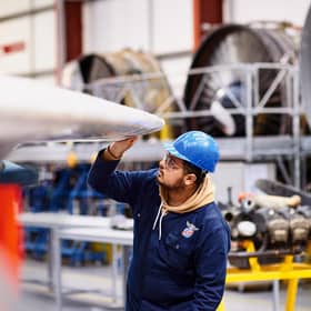 Students studying the aircraft engineering course have access to a range of aircraft and helicopters at Perth Airport to ensure they are equipped with a high level of practical skills. Picture: Fraser Band