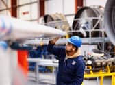 Students studying the aircraft engineering course have access to a range of aircraft and helicopters at Perth Airport to ensure they are equipped with a high level of practical skills. Picture: Fraser Band