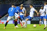 Alfredo Morelos takes a shot against Lech Poznan at Ibrox  (Photo by Robert Perry - Pool/Getty Images)