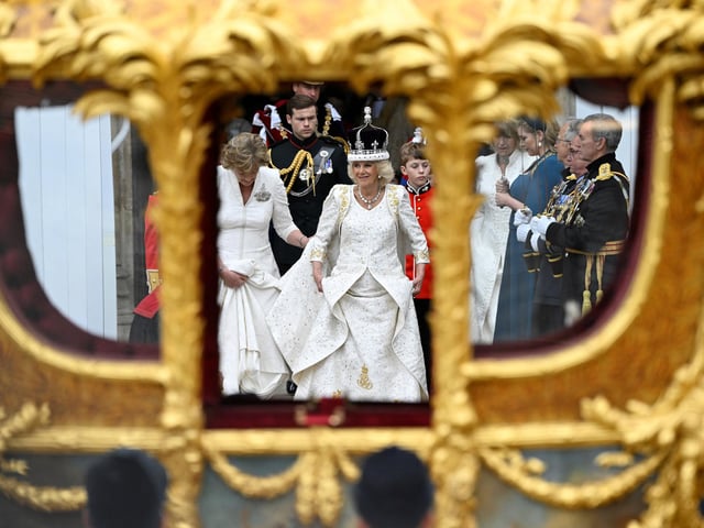 Queen Camilla departs Westminster Abbey, London, following her Coronation alongside King Charles III.