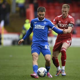 Aberdeen's Ross McCrorie applies pressure to Rangers' Nicolas Raskin during the match at Pittodrie on April 23. (Photo by Rob Casey / SNS Group)
