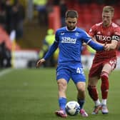 Aberdeen's Ross McCrorie applies pressure to Rangers' Nicolas Raskin during the match at Pittodrie on April 23. (Photo by Rob Casey / SNS Group)