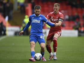 Aberdeen's Ross McCrorie applies pressure to Rangers' Nicolas Raskin during the match at Pittodrie on April 23. (Photo by Rob Casey / SNS Group)