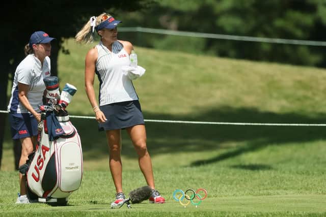 Lexi Thompson with USA team manager Donna Wilkins at the end of the opening round of the women's Olympic event in Japan. Picture: Mike Ehrmann/Getty Images.