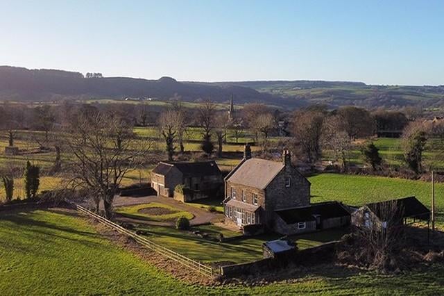 Whaley Grange, which sits on a plot covering half-an-acre in the village of Ashover, near Chesterfield. This aerial shot conveys its spectacular setting.