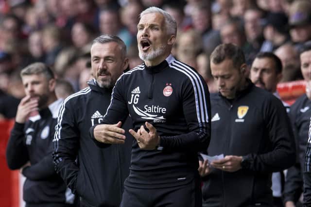 Aberdeen manager Jim Goodwin takes his team to Celtic on the opening day of the season.