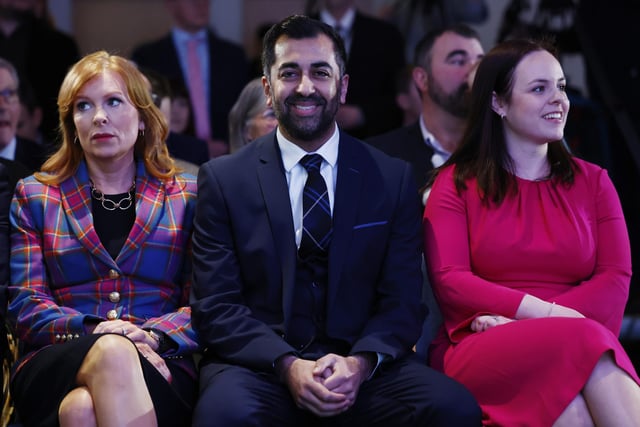 Humza Yousaf (C) reacts as the SNP vote for their new party leader