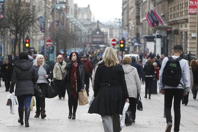Shoppers on Buchanan Street in Glasgow. Despite decent footfall across Scotland last month, spending was disappointing.