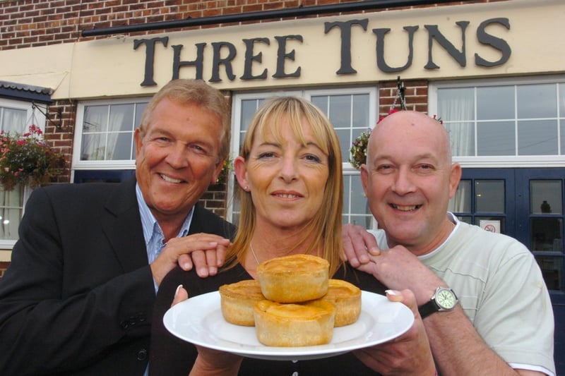 Getting ready for the 2007 Pork Pie Show at the Three Tuns in Houghton, were, left to right, John Gibson, Bridget James and Charlie Lee.