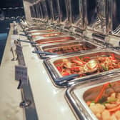 Buffet meals usually involve customers re-using serving spoons and gathering at the same place (Picture: Habibur Rahman)