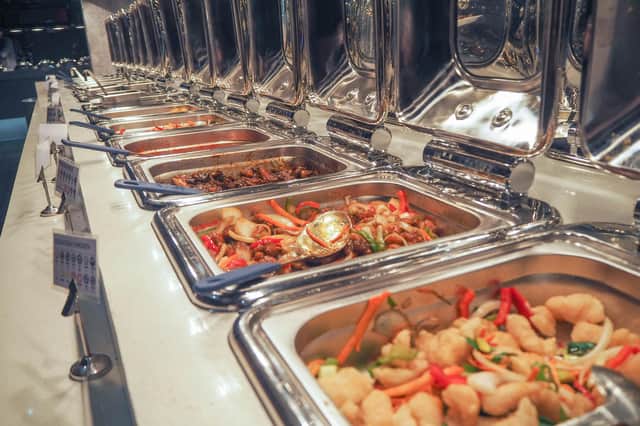 Buffet meals usually involve customers re-using serving spoons and gathering at the same place (Picture: Habibur Rahman)