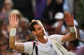 Andy Murray waves as he leaves Centre Court following his second round defeat to Stefanos Tsitsipas at Wimbledon. (Photo by SEBASTIEN BOZON/AFP via Getty Images)