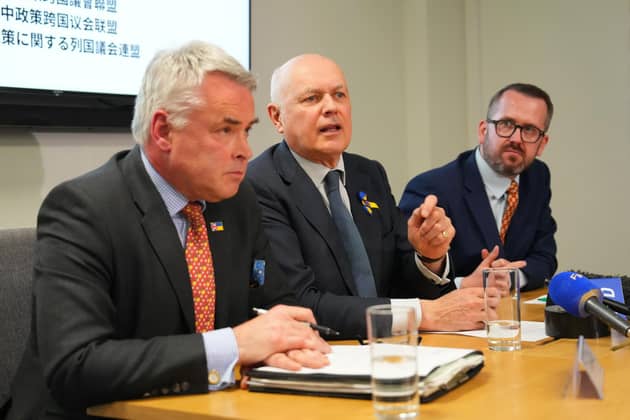 Conservative MPs Tim Loughton and Iain Duncan Smith and SNP MP Stewart McDonald held a press conference about China-linked cyberattacks earlier this week (Picture: Carl Court/Getty Images)