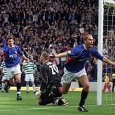 Rangers hero Peter Lovenkrands (middle) celebrates scoring a last-gasp winner against Celtic in the 2002 Scottish Cup final at Hampden.