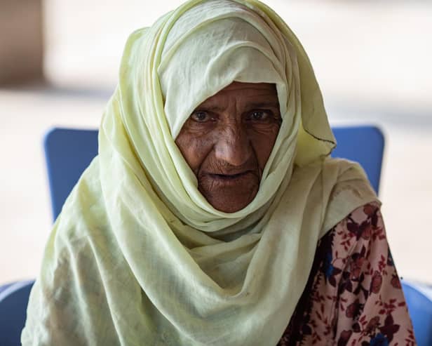 Haleema says her family has been living in a tent since the floods last September. Picture: Khaula Jamil/DEC