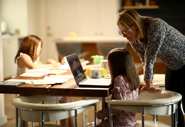 Children can miss out if both parents have full-time jobs. A shorter working week would increase the amount of family time (Picture: Ezra Shaw/Getty Images)